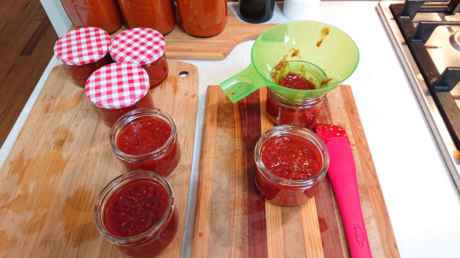 Tomato relish bottled in glass jars