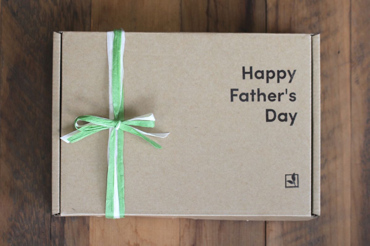 A Kraft gift box with 'Happy Fathers Day' stamped on it