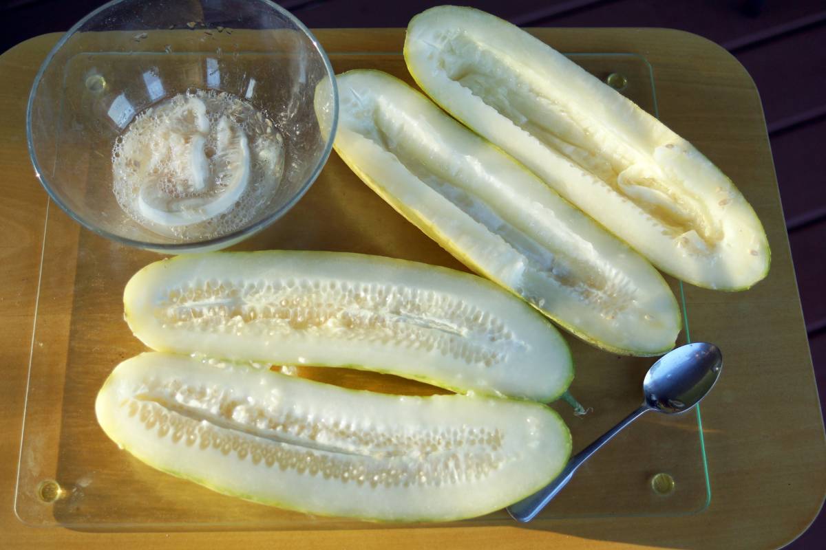 removing cucumber seeds from the fleshy fruit
